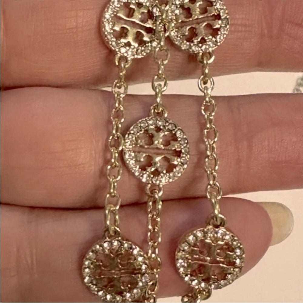 Tory Burch gold crystal pave triple strand logo bracelet - Picture 1 of 8